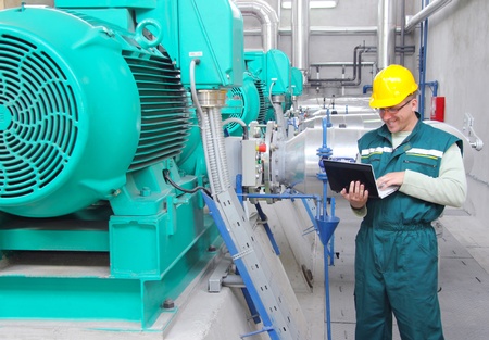 Industrial worker with notebook