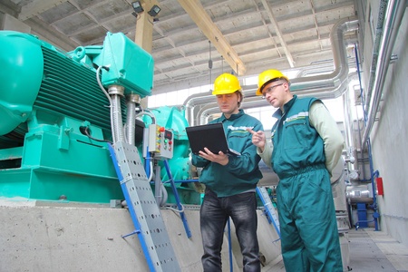 Industrial workers, teamwork Industrial workers, teamwork