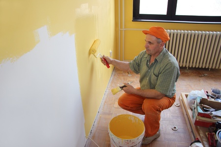 Painter in action, interior decorationの写真素材