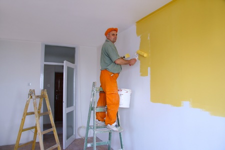 Painter in action, interior decorationの写真素材