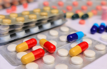 Lots of different medicine drugs, pills, tablets, capsulesの写真素材
