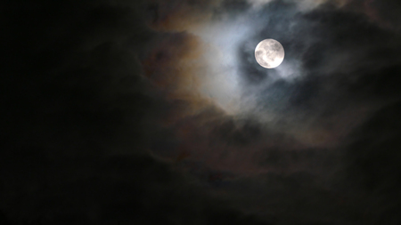 Full Moon And Cloudy Skyの写真素材