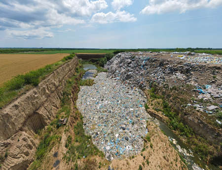 Garbage dump pollution, lots of plastic bags, environmental pollution landfill near the city. Nature...