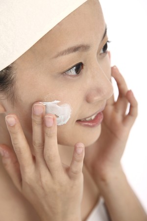 Woman washing her faceの写真素材
