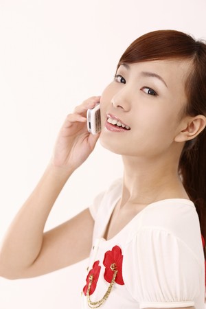 Woman talking on the phoneの写真素材
