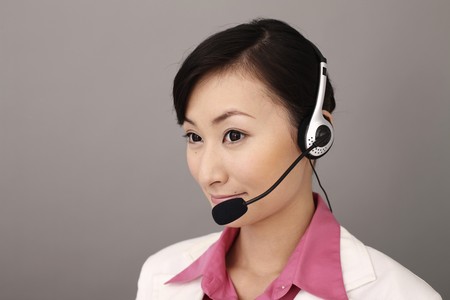 Businesswoman with telephone headset