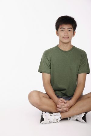 Man sitting in lotus positionの写真素材