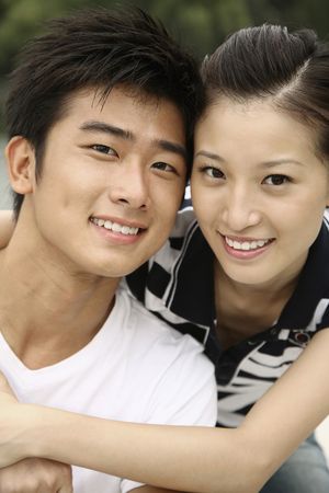 Man and woman posing on the boatの写真素材
