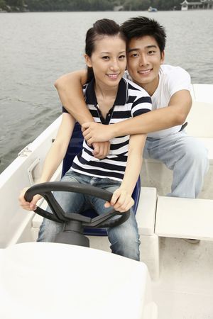 Man and woman traveling on the boatの写真素材