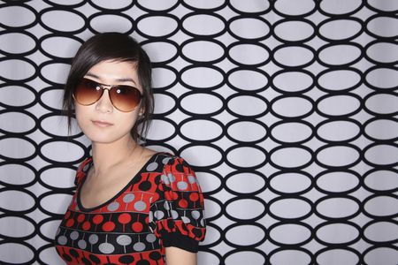 Woman with sunglasses looking at the cameraの写真素材