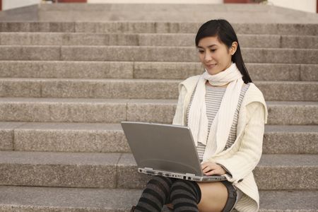 Woman using laptopの写真素材