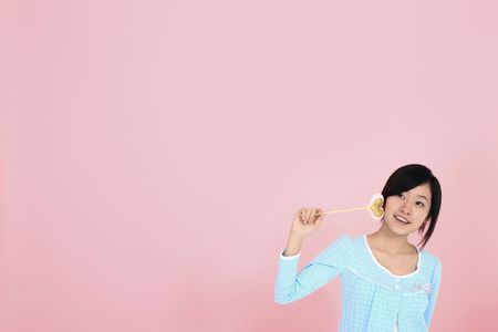 Woman posing with magic wandの写真素材