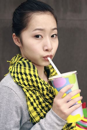 Woman with a cup of drinkの写真素材