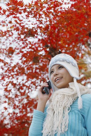 Woman talking on the phoneの写真素材