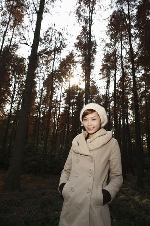 Woman in warm clothing smilingの写真素材