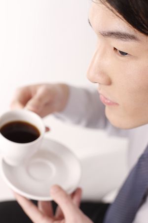 Man enjoying a cup of coffeeの写真素材