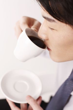 Man enjoying a cup of coffeeの写真素材