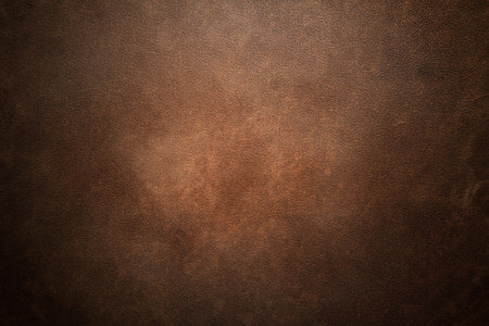 Old brown leather backgroundの写真素材