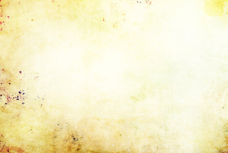 Old grunge yellow canvas texture fabric background with stainsの写真素材