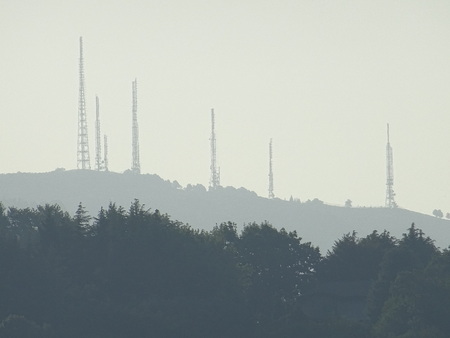 Range of distant repeaters wrapped in mistの写真素材