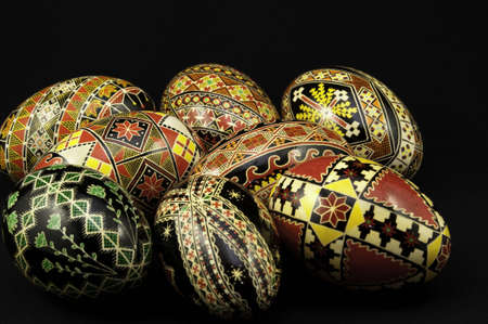 Pysanky eggs on a black background. They show the traditional designs on the eggs.の写真素材