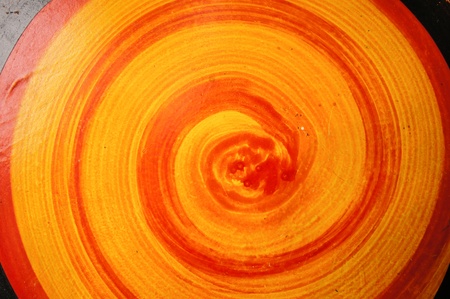 Red and yellow wooden chair made ââof cement.の写真素材