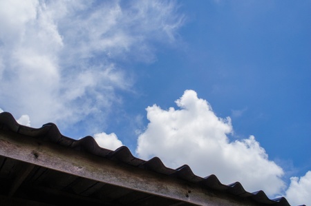 The roof garden with a beautiful sky and fluffy clouds.