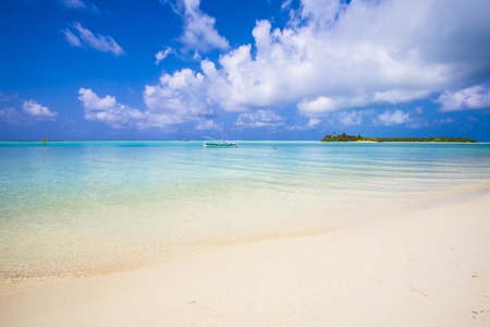 view to a tropical island from the beachの写真素材