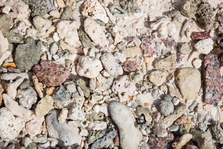 background of little brown and grey pebble stonesの写真素材