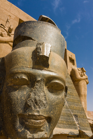 head of the statue from king Ramesses II in front of the Ramesseum temple, Egypt, Africaの写真素材