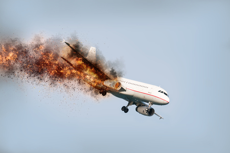 flying aircraft with exploding aero engine just before air crashの写真素材