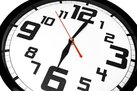 Classic wall clock isolated on the white background