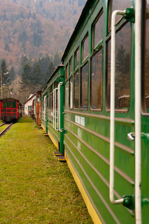 Railway carriages stand on a railway sidingの写真素材