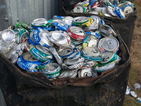 Dekai, Indonesia - January 21, 2015: squeezed aluminium cans in large containersのeditorial素材