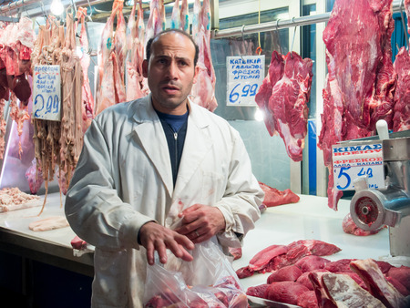 Athens, Greece, - April 06, 2015: City Market. Sellers are promoting their fresh meat.のeditorial素材