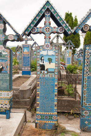 Sapanta, Romania-June 29, 2015: Colorful wooden tombstones in the cemeteryのeditorial素材