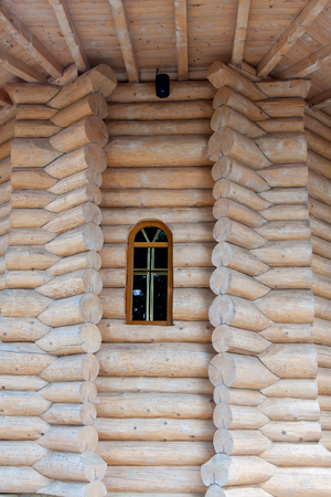 Drogomirna, Romania- 01 July, 2015:  Built with bright wooden logs Orthodox Church of St. Peter and St. Paulのeditorial素材