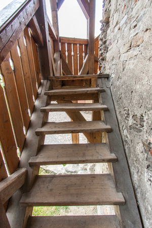 Sighisoara, Romania-July 03, 2015:   A wooden staircase leading to the second floor of the watchtowerのeditorial素材