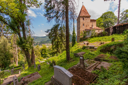 Sighisoara, Romania-July 03, 2015: The old historic town house on the edge of the cemetery next to the old townのeditorial素材
