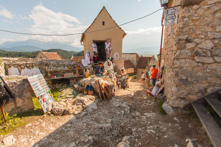 Rasnov, Romania - July 04, 2015: The stone, brick hut inside the medieval castleのeditorial素材