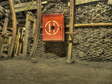 Ruda Slaska, Poland - November 05, 2015: Coal mine. Box with fire hydrant in a tunnel of a mine.のeditorial素材