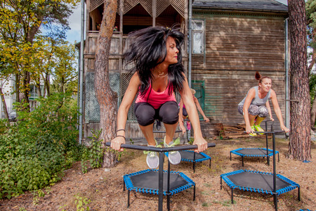 Otwock, Poland - Septemberr 25, 2016:  Fitness women jumping on small trampolinesのeditorial素材