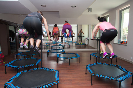 Otwock, Poland - Septemberr 25, 2016:  Fitness women jumping on small trampolinesのeditorial素材