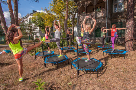 Otwock, Poland - Septemberr 25, 2016:  Fitness women jumping on small trampolinesのeditorial素材