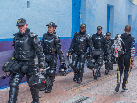 Bogota, Colombia - May 01, 2016: Armed riot police on the streets of Bogotaのeditorial素材