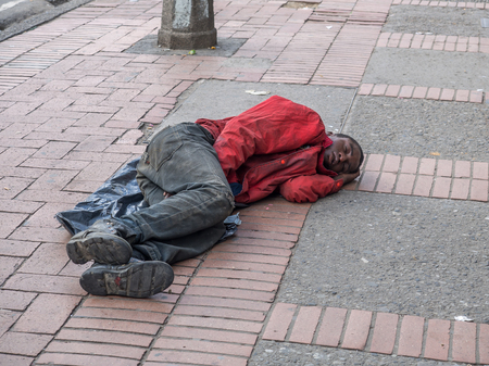 Bogota, Colombia - May 01, 2016: A homeless man sleeping on the street Bogota