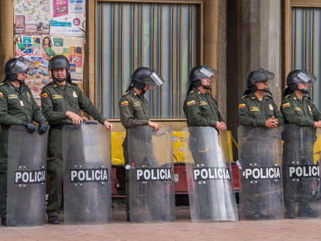 Bogota, Colombia - May 01, 2016: Armed riot police on the streets of Bogota