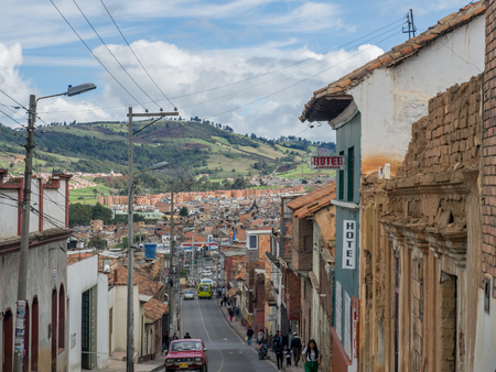 Tunja, Colombia - May 02, 2016: Steep and narrow street of the  small town.のeditorial素材