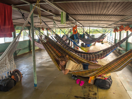 Amazon River, Peru - May 12, 2016: Beautiful, colorful hammocks on the cargo boat.のeditorial素材