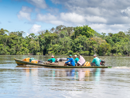 Amazon River, Brazil: - May 07, 2016: Small boat with locals on the Amazon Riverのeditorial素材